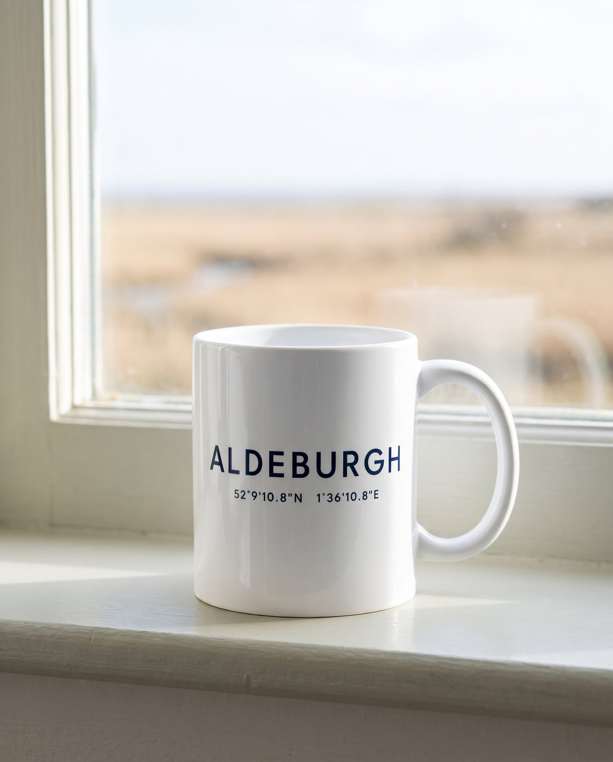 Your Town Merch — Aldeburgh Coordinates Ceramic Mug lifestyle
