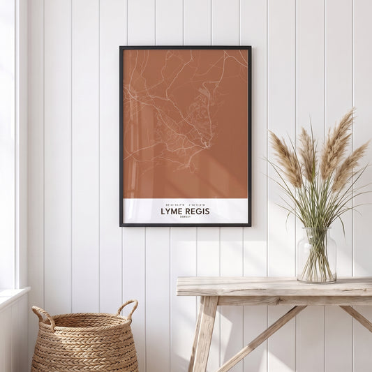 Your Town Merch — Lyme Regis Framed Map Print (Terracotta) lifestyle
